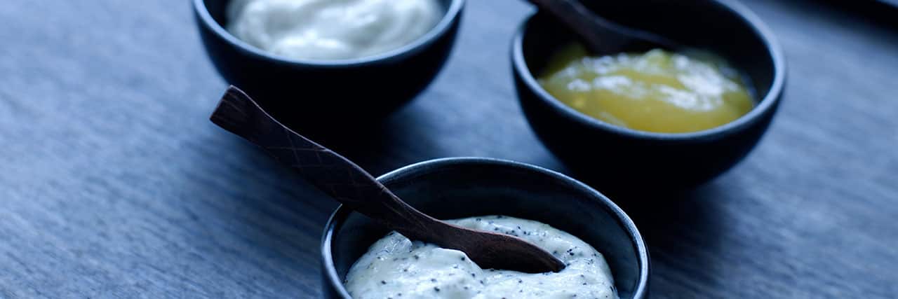 three bowls with lotion