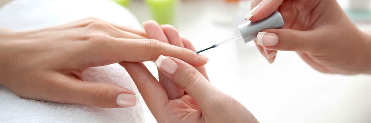 Woman Getting Manicure